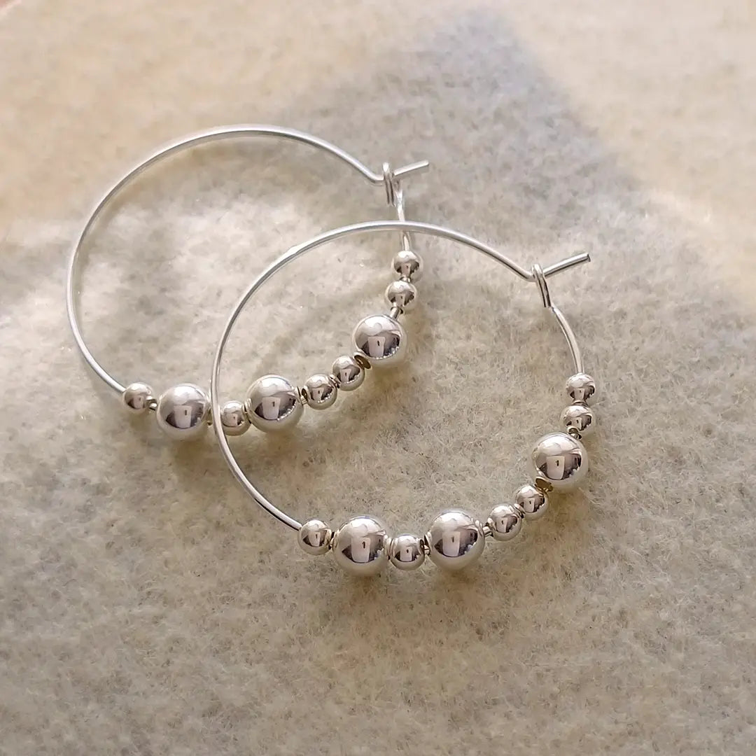 Viesti | Äiti korvakoru hopea