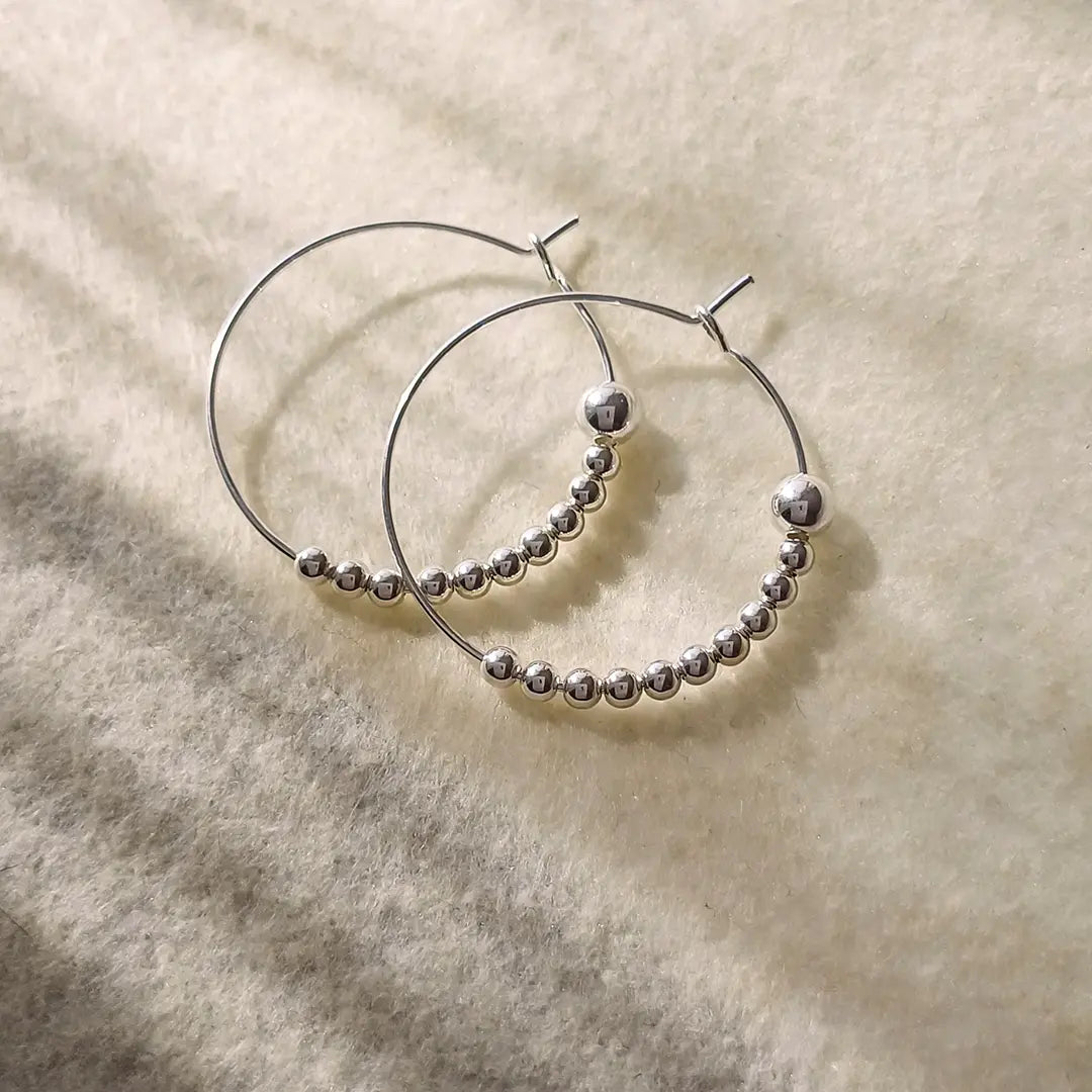 Viesti | Sisu korvakoru hopea