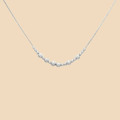 Hopeinen Viesti-kaulakoru, jossa lukee morseaakosilla Vapaus.